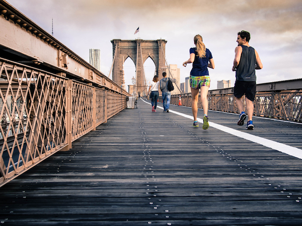 man and woman jogging