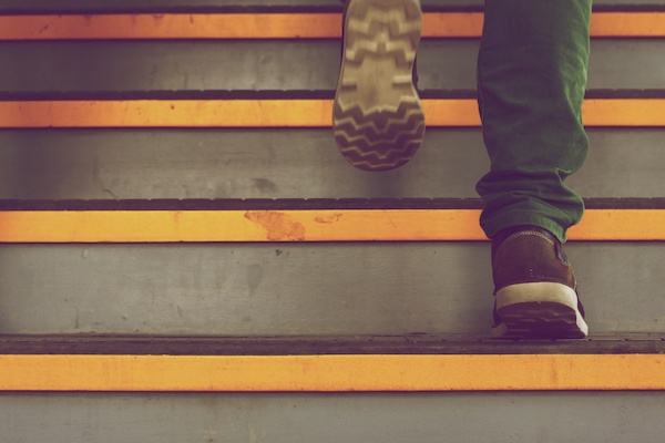 man taking the stairs and being active