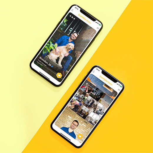 Bumble date profile pages open on smartphones set on yellow background